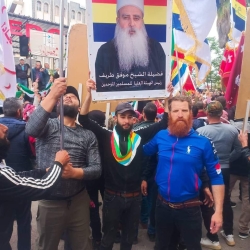 דרוזים סורים מפגינים נגד אסד עם תמונת השייך טריף