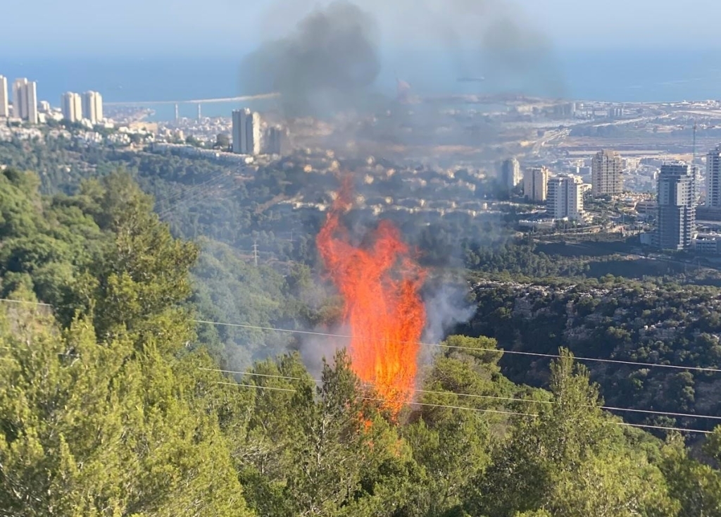  שרפה בשטח פתוח בכרמל כתוצאה משברי אמל''ח